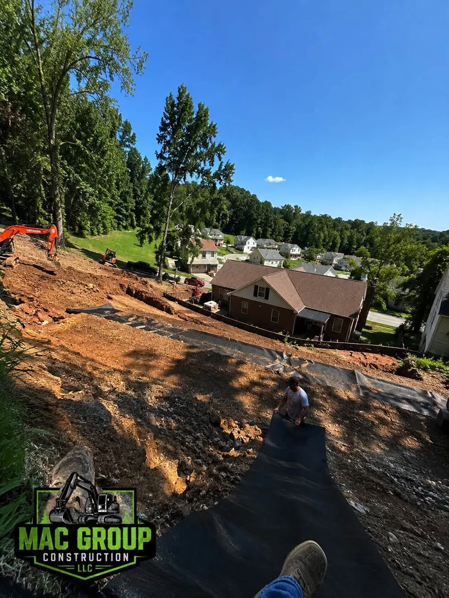 Excavated slope behind a house